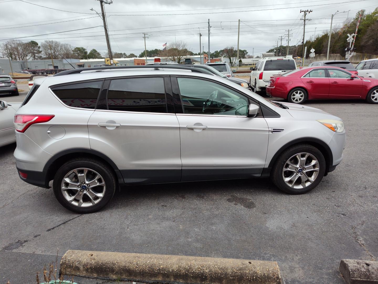 2014 Silver Ford Escape (1FMCU0GX7EU) , Automatic transmission, located at 5700 Curlew Drive, Norfolk, VA, 23502, (757) 455-6330, 36.841885, -76.209412 - Photo#16